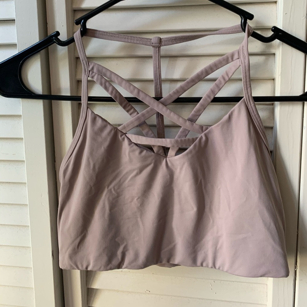 Pink Victoria’s Secret sports bra